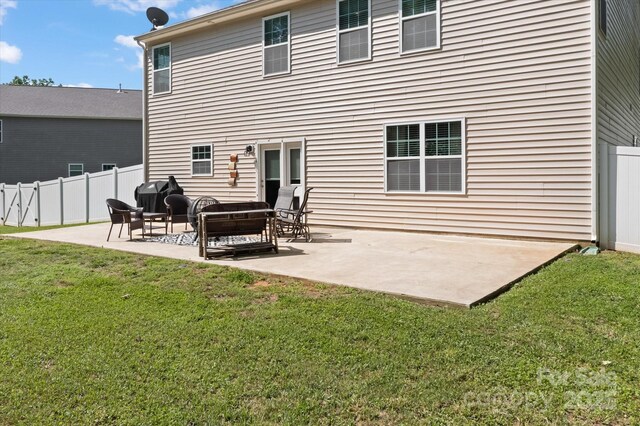 301 Wheat Field Dr, Mount Holly, NC 28120 - rear view of property featuring a patio area and an outdoor living space