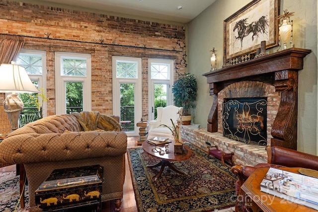 231 N Main St, Hendersonville, NC 28792 - living area featuring brick wall and a fireplace