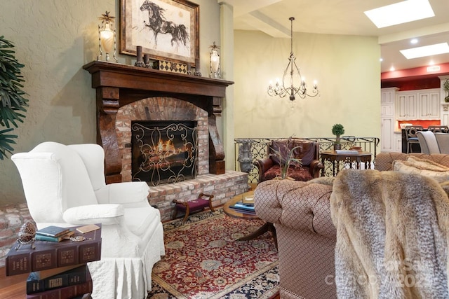231 N Main St, Hendersonville, NC 28792 - living room with a skylight, a chandelier, a textured wall, and a fireplace