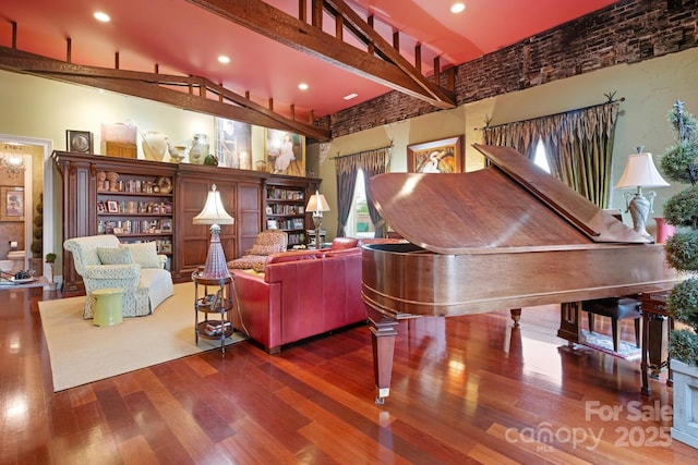231 N Main St, Hendersonville, NC 28792 - living room featuring a towering ceiling, wood finished floors, and recessed lighting