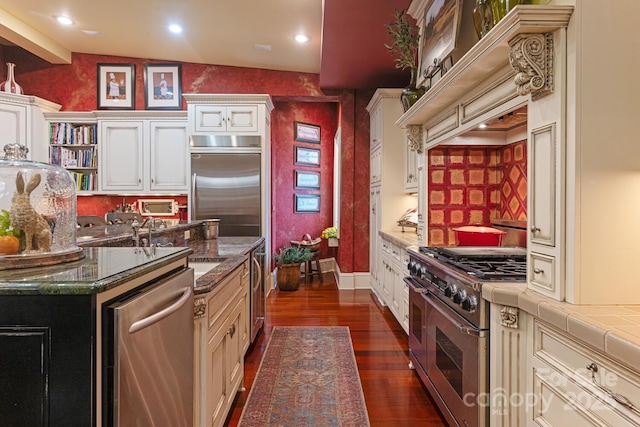 231 N Main St, Hendersonville, NC 28792 - kitchen featuring high quality appliances, dark wood-style flooring, open shelves, a sink, and recessed lighting