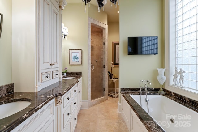 231 N Main St, Hendersonville, NC 28792 - full bathroom featuring a stall shower, vanity, a bath, and tile patterned floors