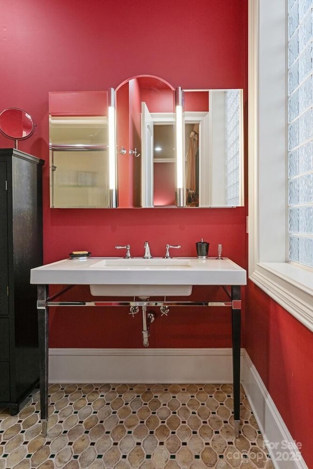231 N Main St, Hendersonville, NC 28792 - bathroom with vanity and baseboards