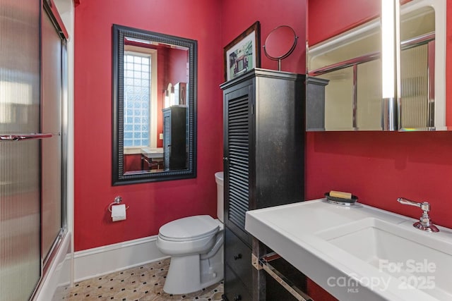 231 N Main St, Hendersonville, NC 28792 - full bathroom with toilet, an enclosed shower, baseboards, and vanity