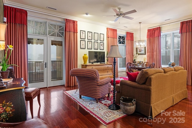 231 N Main St, Hendersonville, NC 28792 - living room featuring a chandelier, wood finished floors, ceiling fan, and crown molding