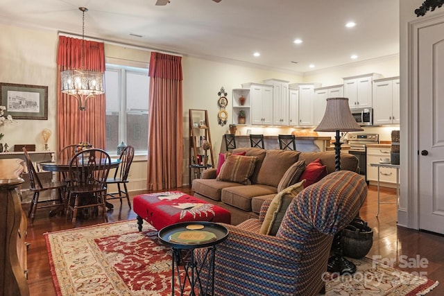 231 N Main St, Hendersonville, NC 28792 - living room featuring wood finished floors, ornamental molding, and recessed lighting