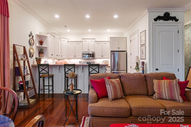231 N Main St, Hendersonville, NC 28792 - living area featuring dark wood-type flooring, ornamental molding, and recessed lighting
