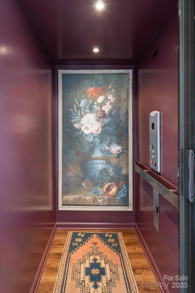 231 N Main St, Hendersonville, NC 28792 - elevator with wood finished floors, baseboards, and recessed lighting