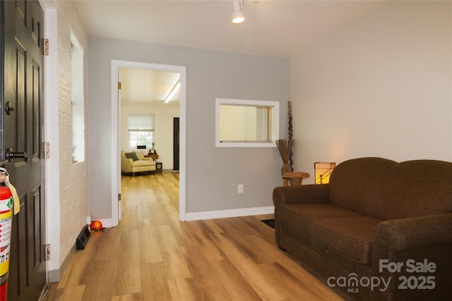 1028 Washburn Switch Rd, Shelby, NC 28150 - sitting room with light wood-style floors and baseboards