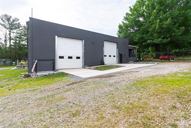1028 Washburn Switch Rd, Shelby, NC 28150 - detached garage featuring gravel driveway