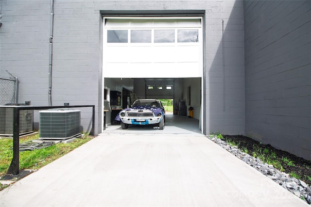 1028 Washburn Switch Rd, Shelby, NC 28150 - garage featuring central air condition unit and concrete driveway