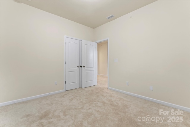 966 NW Parkland Pl, Concord, NC 28027 - spare room featuring carpet flooring and baseboards