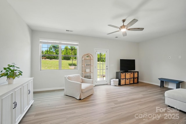 5334 Orchid Bloom Dr, Fort Mill, SC 29707 - living area featuring light wood finished floors, baseboards, and ceiling fan