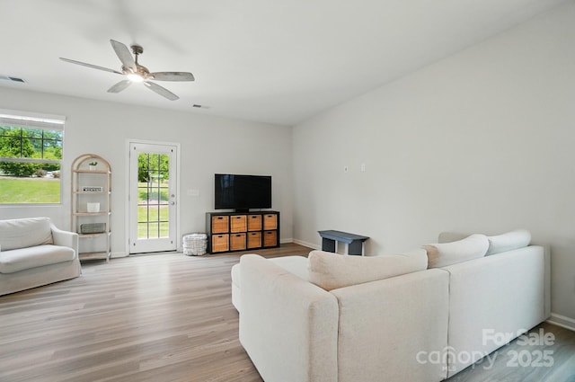 5334 Orchid Bloom Dr, Fort Mill, SC 29707 - living room featuring light wood finished floors, ceiling fan, and baseboards