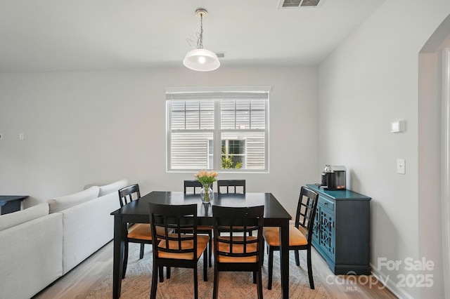 5334 Orchid Bloom Dr, Fort Mill, SC 29707 - dining room featuring light wood-type flooring and baseboards