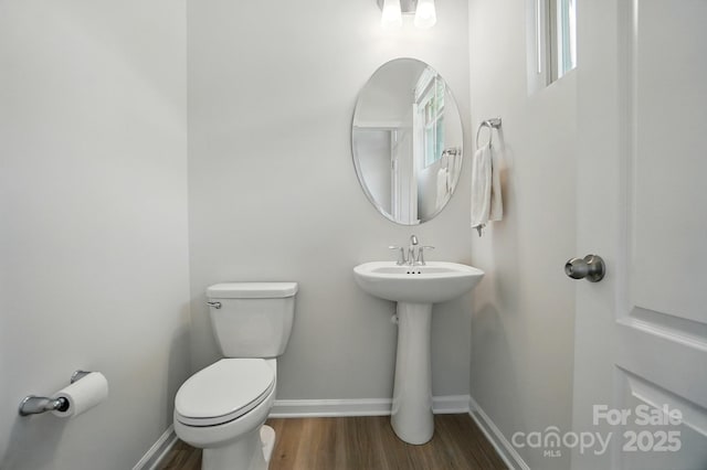 5334 Orchid Bloom Dr, Fort Mill, SC 29707 - bathroom with wood finished floors, toilet, baseboards, and a sink