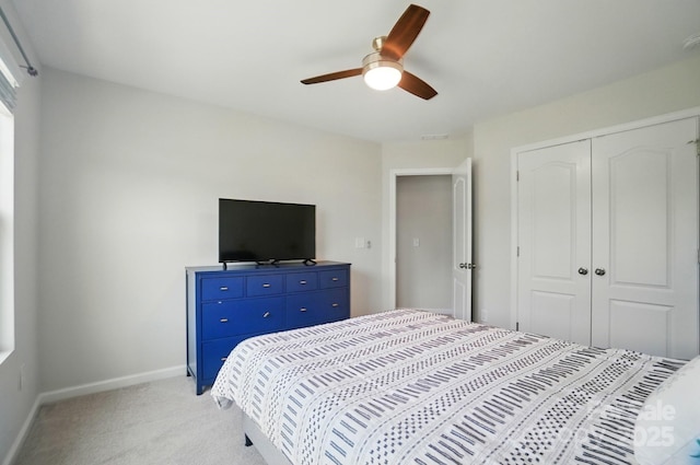 5334 Orchid Bloom Dr, Fort Mill, SC 29707 - bedroom with light colored carpet, a closet, baseboards, and a ceiling fan