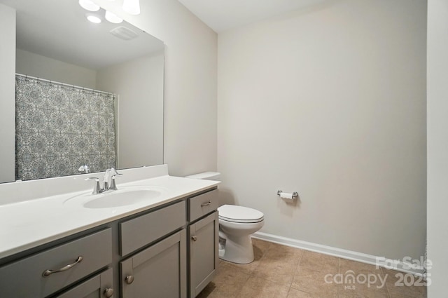 5334 Orchid Bloom Dr, Fort Mill, SC 29707 - bathroom with toilet, vanity, tile patterned floors, and baseboards