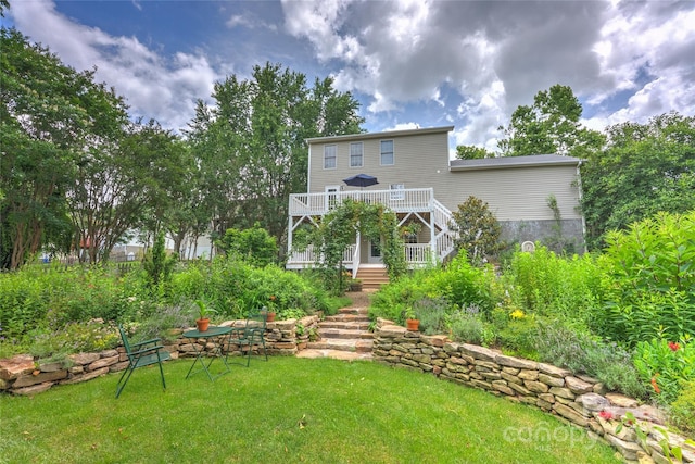 7 Mill Stone Dr, Asheville, NC 28803 - back of property featuring stairs, a lawn, and a deck