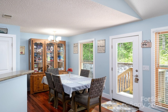 178 Susanna Cove Rd, Mars Hill, NC 28754 - dining area with dark wood-style floors, a chandelier, and a textured ceiling