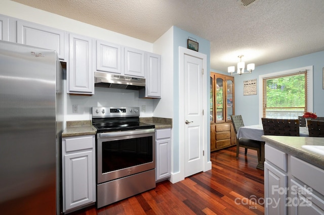 178 Susanna Cove Rd, Mars Hill, NC 28754 - kitchen with appliances with stainless steel finishes, under cabinet range hood, dark wood-style flooring, a chandelier, and a textured ceiling