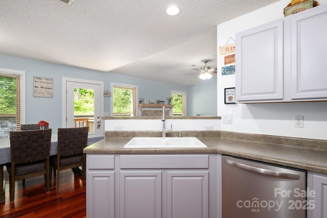 178 Susanna Cove Rd, Mars Hill, NC 28754 - kitchen featuring dishwasher, a textured ceiling, a peninsula, ceiling fan, and white cabinets
