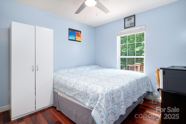 178 Susanna Cove Rd, Mars Hill, NC 28754 - bedroom with dark wood-type flooring and ceiling fan