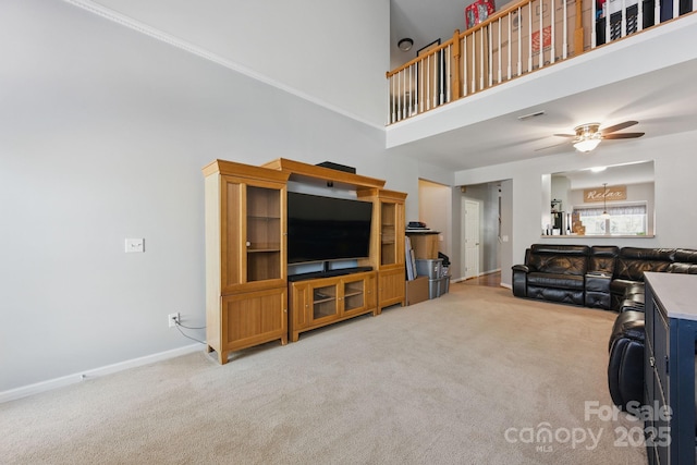 158 Snead Rd, Fort Mill, SC 29715 - living area featuring light carpet, a high ceiling, and a ceiling fan