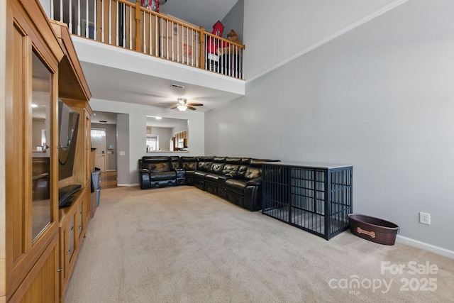 158 Snead Rd, Fort Mill, SC 29715 - living room featuring light carpet, a ceiling fan, and a towering ceiling