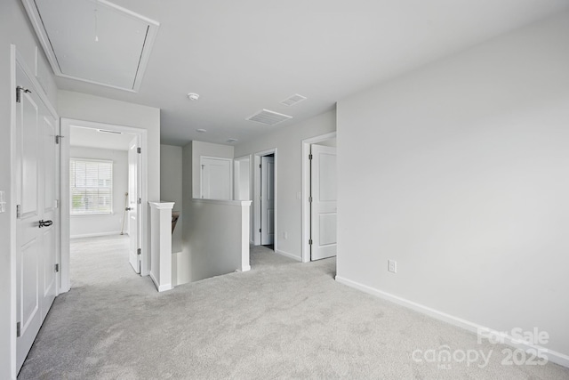 223 Haddonsfield Dr, Mooresville, NC 28115 - corridor featuring attic access, an upstairs landing, carpet floors, and baseboards