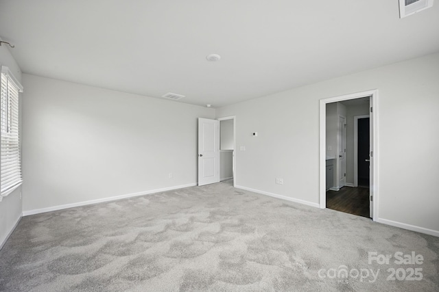223 Haddonsfield Dr, Mooresville, NC 28115 - unfurnished bedroom featuring carpet and baseboards