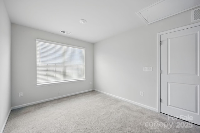223 Haddonsfield Dr, Mooresville, NC 28115 - empty room featuring attic access, baseboards, and carpet flooring
