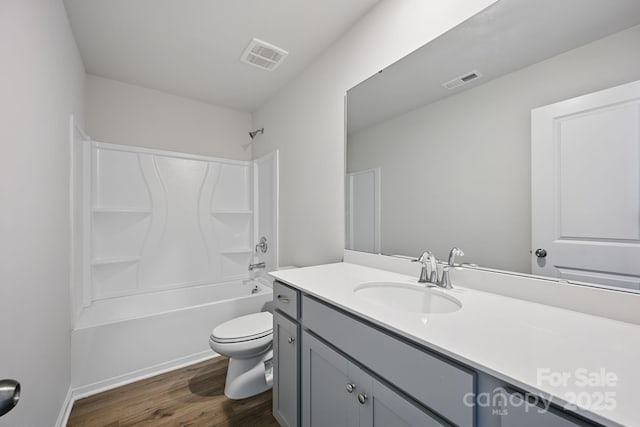223 Haddonsfield Dr, Mooresville, NC 28115 - full bath with toilet, vanity, wood finished floors, and shower / tub combination
