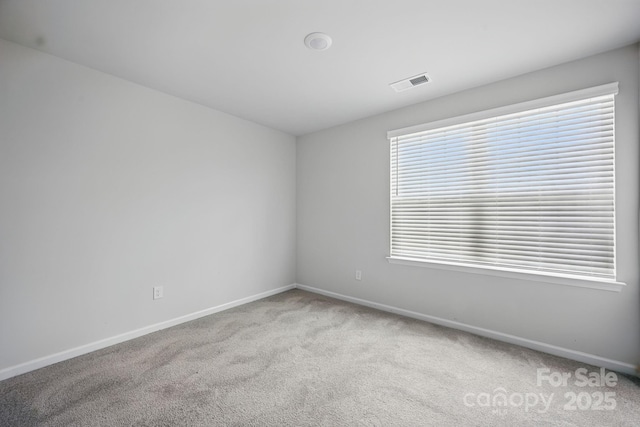 223 Haddonsfield Dr, Mooresville, NC 28115 - spare room featuring baseboards and carpet flooring