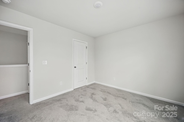 223 Haddonsfield Dr, Mooresville, NC 28115 - unfurnished bedroom featuring carpet and baseboards