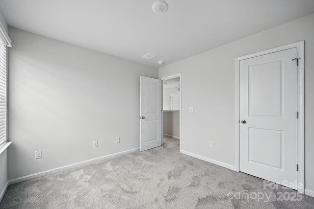 223 Haddonsfield Dr, Mooresville, NC 28115 - unfurnished bedroom featuring carpet floors and baseboards
