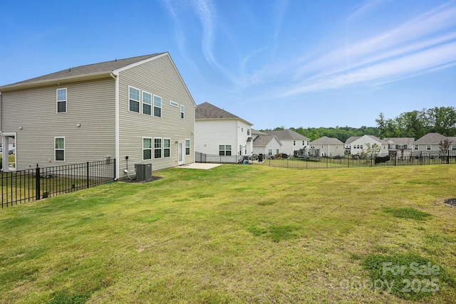 223 Haddonsfield Dr, Mooresville, NC 28115 - back of house featuring central air condition unit, a residential view, and a patio