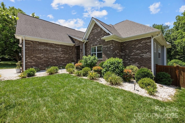 3633 Longpond Ln, Monroe, NC 28110 - view of front of home featuring brick siding and roof with shingles