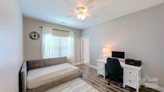 3633 Longpond Ln, Monroe, NC 28110 - office featuring light wood-style flooring, a ceiling fan, and baseboards