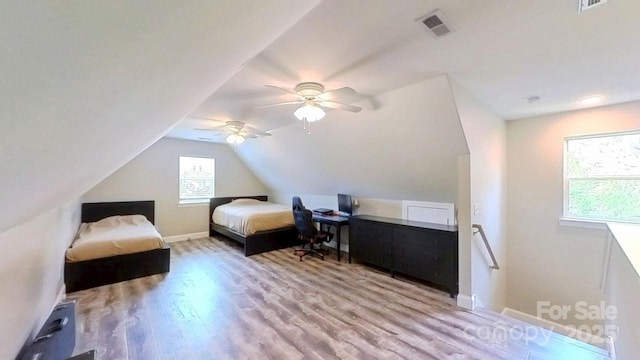 3633 Longpond Ln, Monroe, NC 28110 - bedroom with wood finished floors, baseboards, a ceiling fan, and lofted ceiling