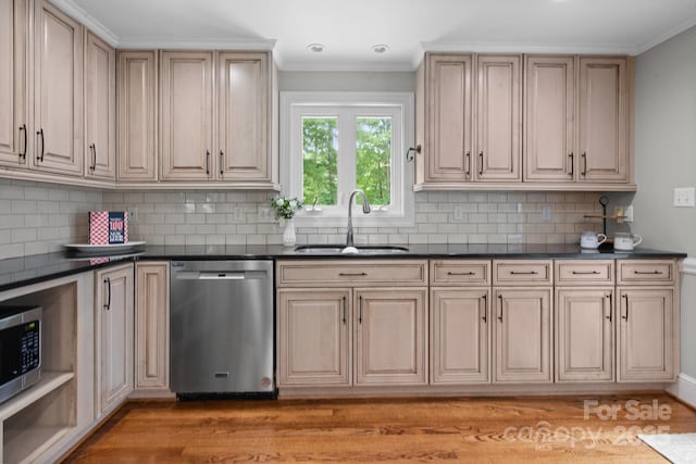 315 Red Barn Trl, Matthews, NC 28104 - kitchen featuring stainless steel appliances, dark countertops, tasteful backsplash, ornamental molding, and light wood-style floors