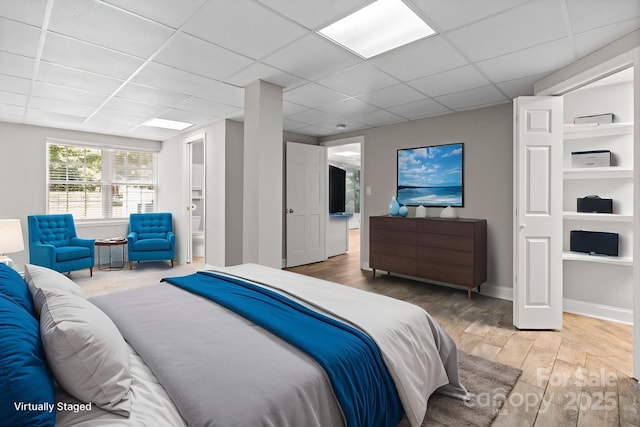 315 Red Barn Trl, Matthews, NC 28104 - bedroom with wood finished floors and a paneled ceiling