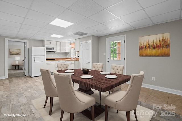 315 Red Barn Trl, Matthews, NC 28104 - dining space with a drop ceiling and light wood-type flooring