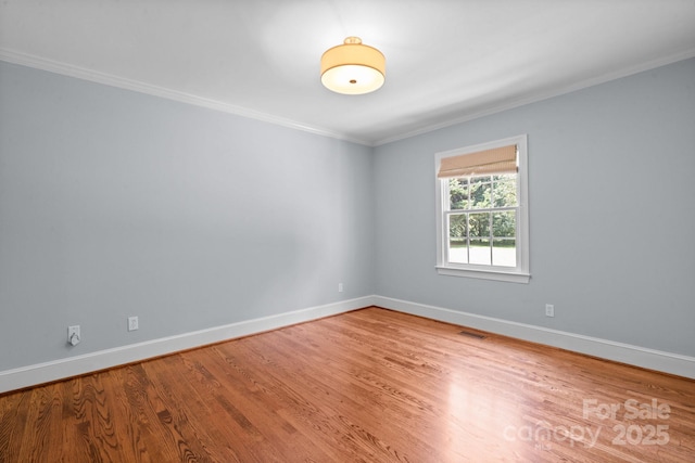 315 Red Barn Trl, Matthews, NC 28104 - empty room featuring wood finished floors and ornamental molding
