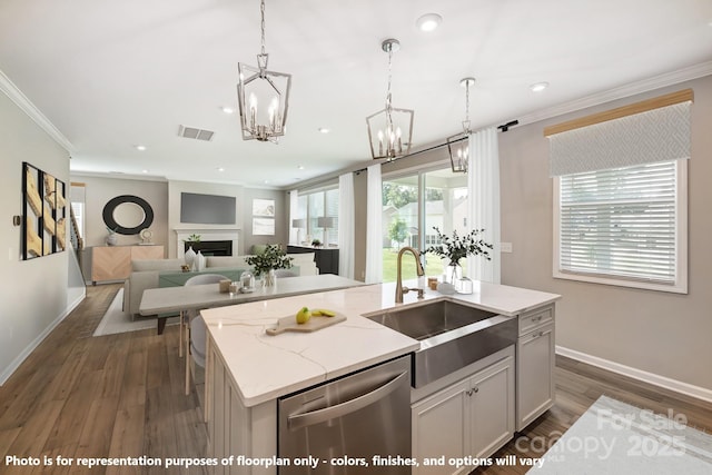 9864 Quercus Ln, Huntersville, NC 28078 - kitchen featuring dishwasher, a sink, a chandelier, crown molding, and a fireplace