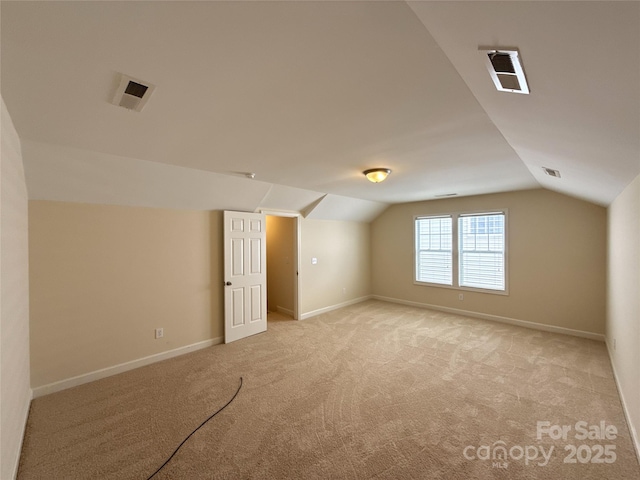 1423 Napa St NW, Concord, NC 28027 - bonus room with light colored carpet, lofted ceiling, and baseboards