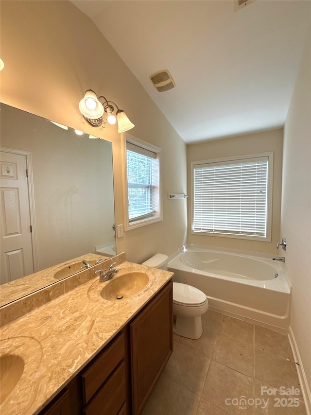 1423 Napa St NW, Concord, NC 28027 - bathroom featuring double vanity, toilet, a garden tub, tile patterned flooring, and lofted ceiling