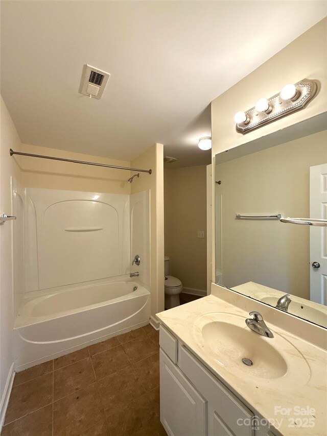1423 Napa St NW, Concord, NC 28027 - full bath with bathing tub / shower combination, vanity, tile patterned flooring, toilet, and baseboards