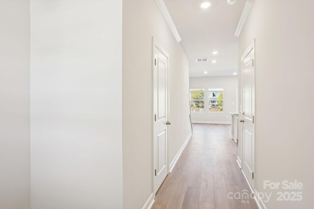 1413 Old Rivers Rd, Concord, NC 28027 - hallway with ornamental molding, recessed lighting, wood finished floors, and baseboards