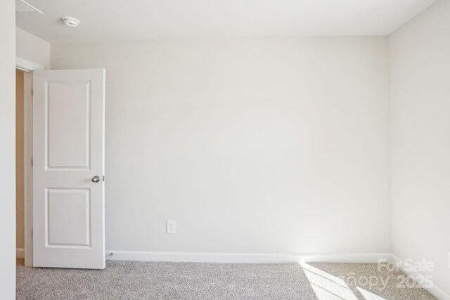 1413 Old Rivers Rd, Concord, NC 28027 - carpeted spare room featuring baseboards and a smoke detector